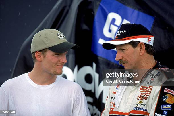 Dale Earnhardt Jr. And Dale Earnhardt Sr. Pose for a photograph after the Pepsi Southern 500 at the Darlington Raceway on September 3, 2000 in...