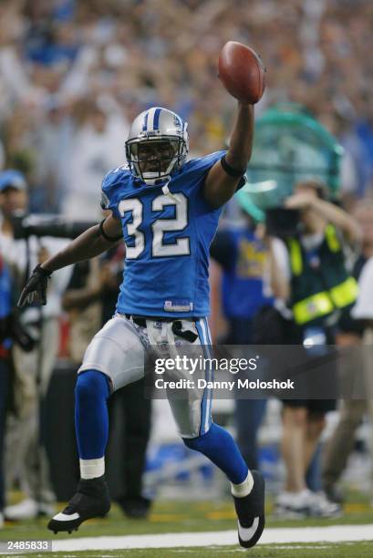 Cornerback Dre Bly of the Detroit Lions celebrates during the NFL game against the Arizona Cardinals at Ford Field on September 7, 2003 in Detroit,...