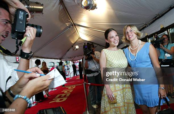 Photographers take photos of actresses Kate Kelton and Sunday Muse, who are starring in Deepa Mehta's "The Republic of Love" at the 2003 Toronto...