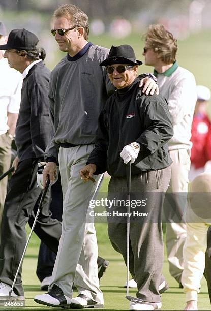 Kevin Costner puts his arm around Joe Pesci during the AT&T National Pro-Am at Pebble Beach Golf Course in Pebble Beach, California. Mandatory...