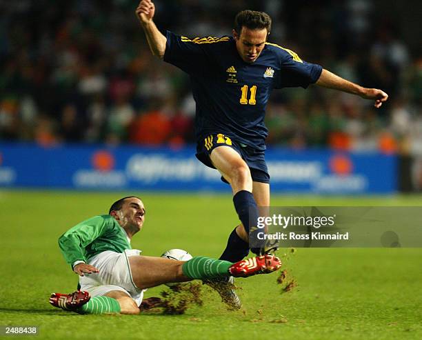 John O'Shea of Republic of Ireland slide tackles Stan Lazaridis of Australia during the friendly international match between Ireland and Australia on...