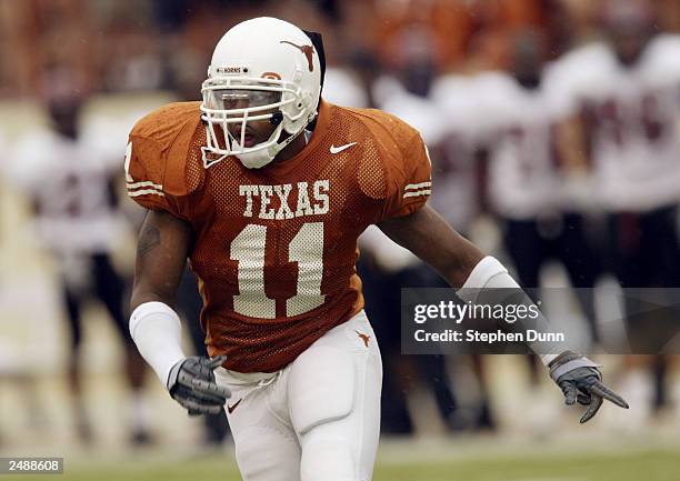 Linebacker Derrick Johnson of the University of Texas at Austin Longhorns jogs during the game against the University of New Mexico Aggies at Texas...