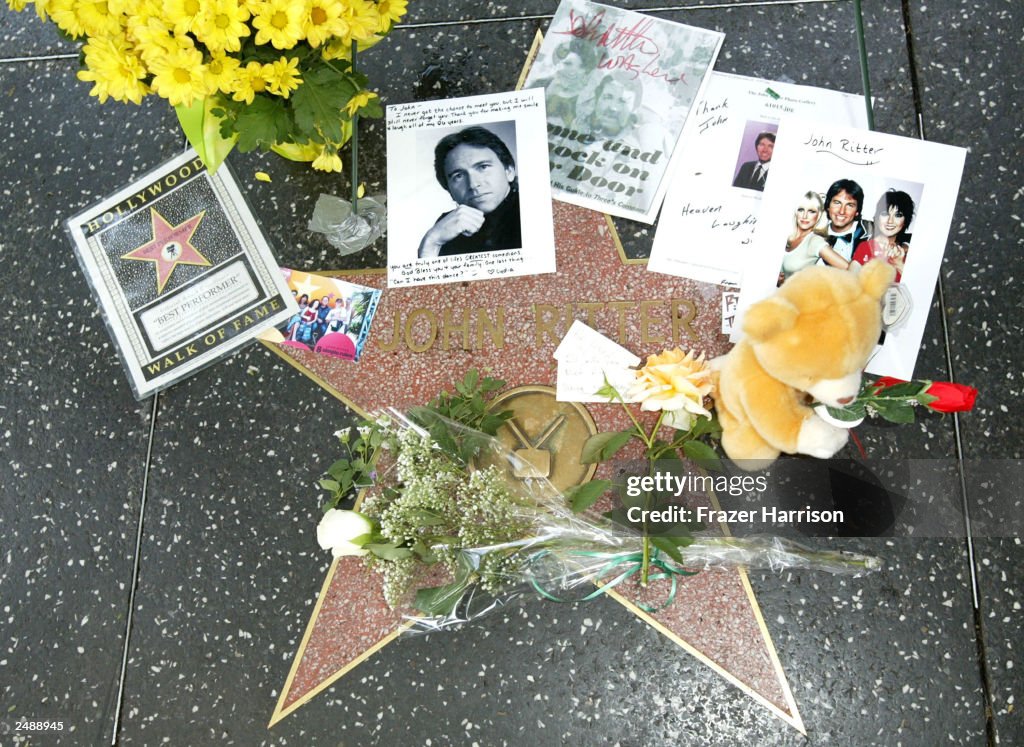 John Ritter Chest Tributes are left on the star of actor John Ritter's on the Hollywood ...