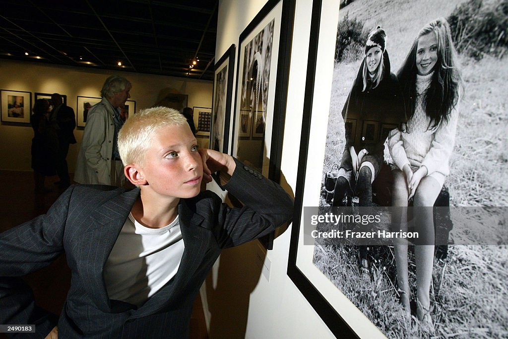 Zack Peck, grandson of late actor Gregory Peck, looks at a portrait