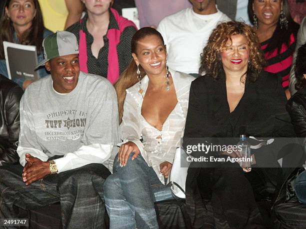 Rapper Jay Z and singer Beyonce Knowles with her mother Tina are seen at the Rosa Cha by Amir Slama Spring/Summer 2004 Collection at Bryant Park...