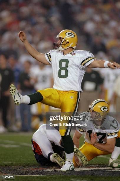 Kicker Ryan Longwell of the Green Bay Packers kicks an extra point against the Denver Broncos during Super Bowl XXXII at Qualcomm Stadium in San...