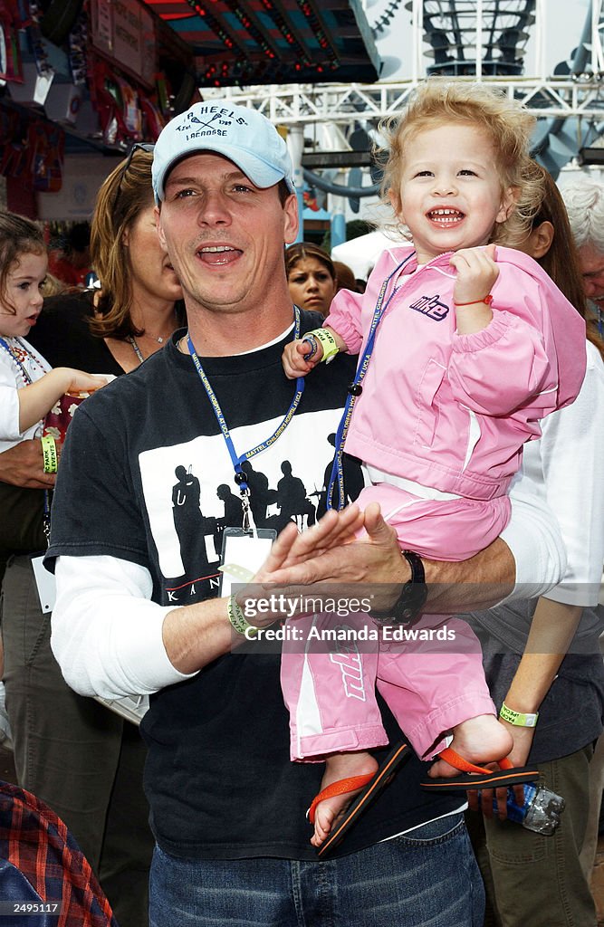 Actor Jason Wiles and his daughter enjoy themselves at the