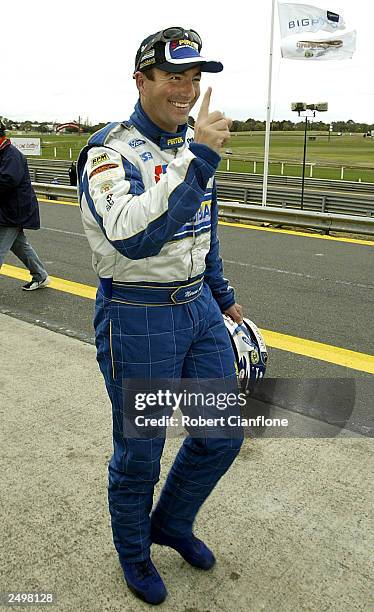 Marcos Ambrose of the Stone Brothers Racing Team celebrates pole position after the final qualifying session for the Sandown 500 which is round 9 of...