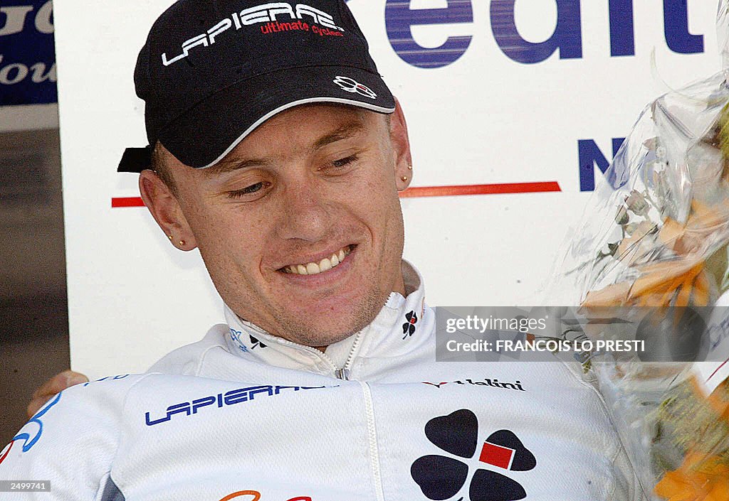 Baden Cook Australian Baden Cooke jubilates on the podium after winning the 71th ...
