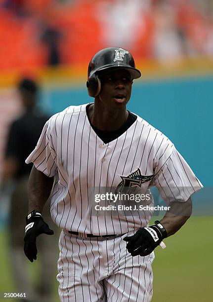 Center fielder Juan Pierre of the Florida Marlins runs the bases after hitting a single shot home run in the 4th inning against the Pittsburgh...