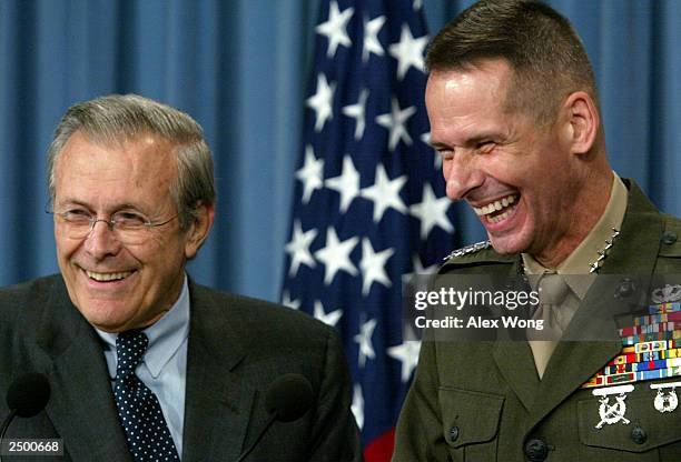 Secdef Rumsfeld 47 Rumsfeld And Pace Hold Pentagon Briefing Stock Photos, High-Res ...