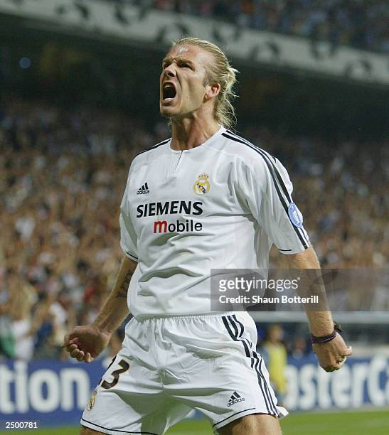 David Beckham of Real Madrid celebrates after the first goal during the UEFA Champions League Group F match between Real Madrid and Olympic Marseille...