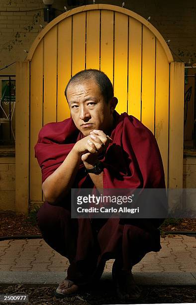 Writer/director Khyentse Norbu of the movie "Travelers & Magicians" poses for photographs at the Hotel Intercontinental during the 2003 Toronto...