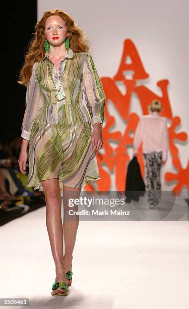 Model walks up the runway during the Anna Sui Spring/Summer 2004 Collection at Bryant Park during the 7th on Sixth Mercedes-Benz New York Fashion...