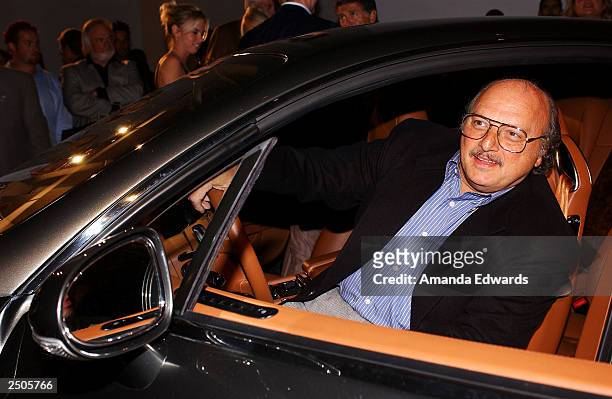 Actor Dennis Franz checks out the interior of a 2004 Bentley Continental GT at the "Pure Anticipation" exhibition launch party at the Gagosian...