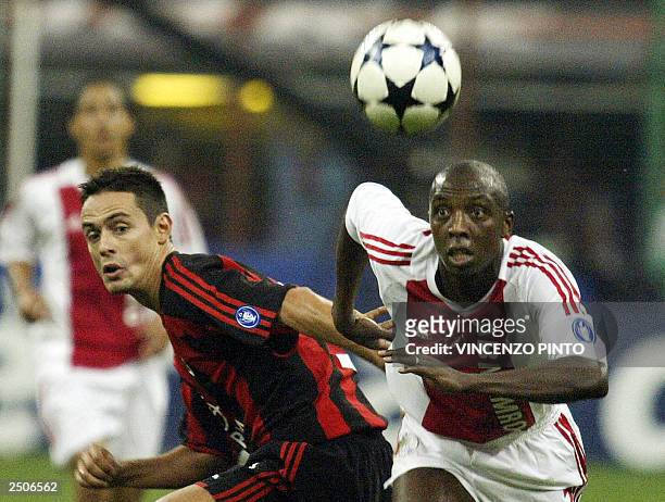 Filippo Inzaghi of AC Milan figths for the ball with AFC Ajax's Abubakari Yabuku during their Champions League Group H match at Meazza stadium in...