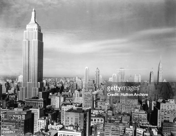 View of the Manhattan skyline with the Empire State Building and Chrysler Building , New York City, 1940s.