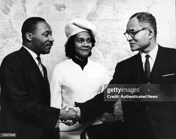American civil rights leader Dr. Martin Luther King, Jr. And his wife Coretta are greeted by Ralph J. Bunche , United Nations Under-Secretary, at the...