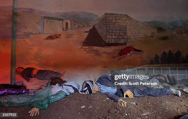 Diorama scene from a memorial in Halabja, Iraq to the 5,000 victims of a chemical gas attack by Saddam Hussein shows September 9 what the aftermath...