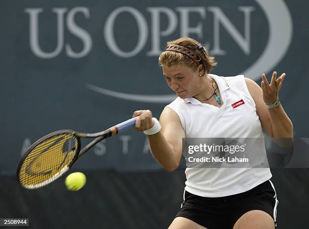 Marlene Weingartner of Germany returns a shot to Marie-Gaianeh Mikaelian of Switzerland during the US Open on August 26, 2003 at the USTA National...