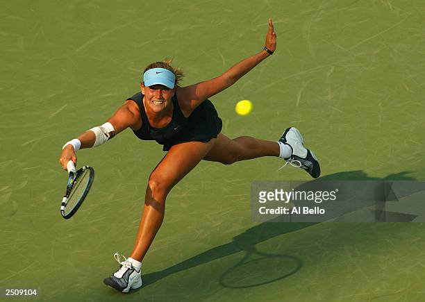 Ashley Harkleroad returns a shot to Vera Zvonareva during the US Open on August 27, 2003 at the USTA National Tennis Center, Flushing Meadows Corona...
