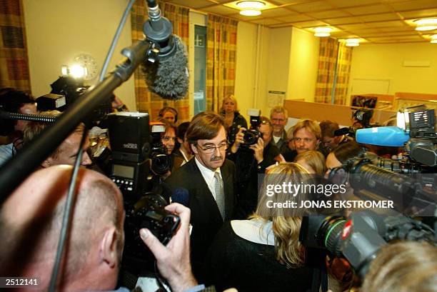 Gunnar Falk , defender of the 35-year-old man suspected of the slaying of Swedish Foreign Minister Anna Lindh, talks to media on his way into the the...