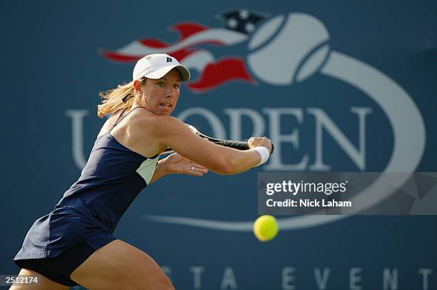 Lisa Raymond returns a shot to Melinda Czink of Hungary during the US Open on August 26, 2003 at the USTA National Tennis Center, Flushing Meadows...