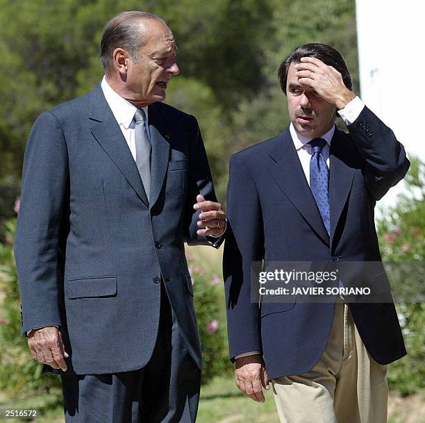 Spanish Prime Minister Jose Maria Aznar confers with French President Jacques Chirac before a meeting at Quintos de Mora in Toledo, south of Madrid...