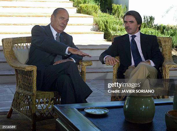 Spanish Prime Minister Jose Maria Aznar speaks with French President Jacques Chirac before a meeting at Quintos de Mora in Toledo, south of Madrid 11...