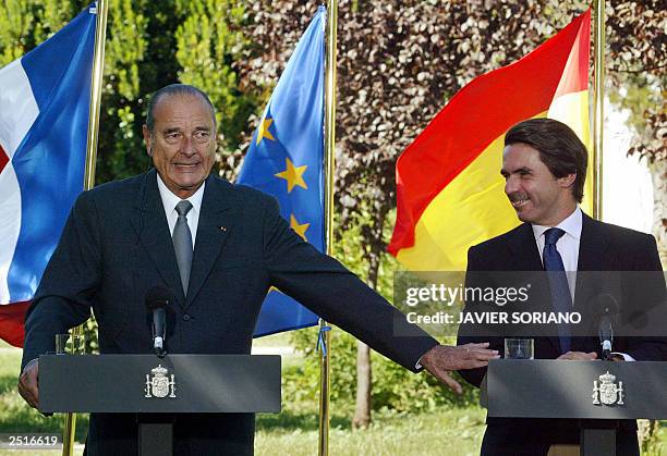 Spanish Prime Minister Jose Maria Aznar and French President Jacques Chirac give a press conference after their meeting at Quintos de Mora in Toledo,...