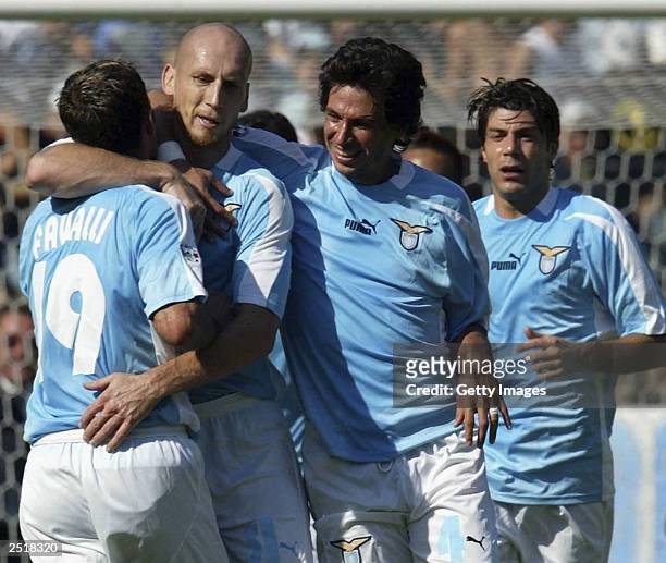 Jaap Stam of Lazio celebrates scoring during the Serie A match between Lazio and Parma at the Olympic Stadium September 21, 2003 in Rome, Italy.