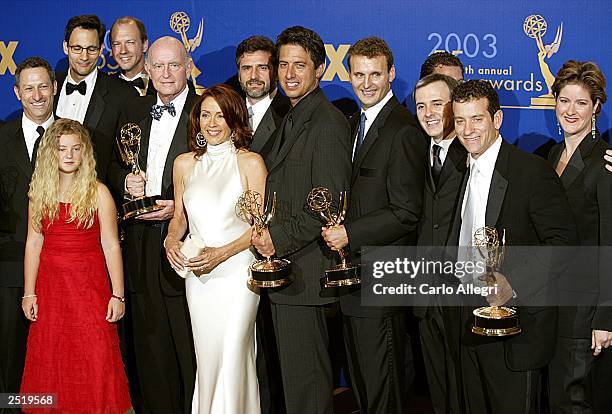 Cast of Everybody Loves Raymond, winner of the Emmy for Outstanding Comedy Series, pose backstage during the 55th Annual Primetime Emmy Awards at the...