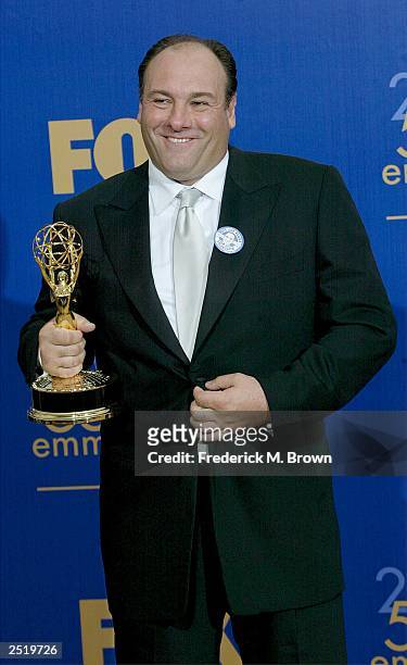 Actor James Gandolfini poses after winning "Outstanding Lead Actor in a Drama" backstage during the 55th Annual Primetime Emmy Awards at the Shrine...
