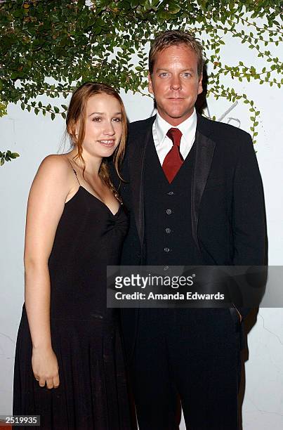 Actor Kiefer Sutherland and his daughter Sarah arrive at the Fox TV Emmy After Party at Mortons on September 21, 2003 in West Hollywood, California.