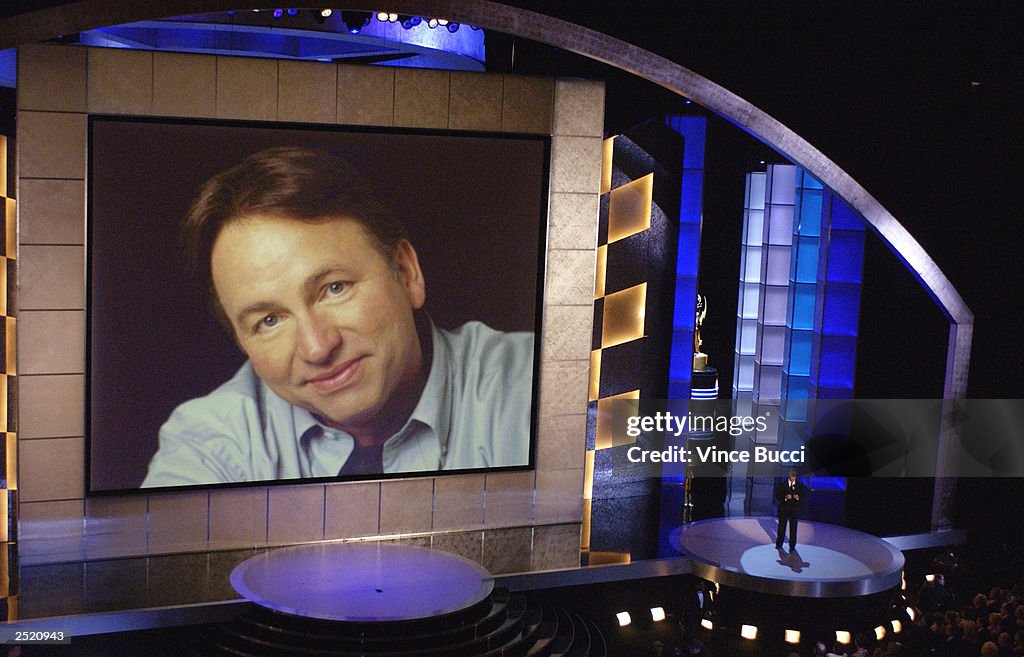 John Ritter Acting Roles An image of actor John Ritter is displayed on stage during the 55th ...