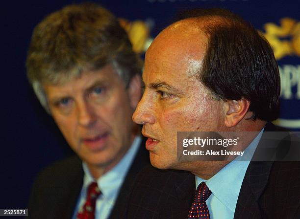 Flanked by tournament referee Brian Early, Arlen Kantarian, USTA chief executive of professional tennis, fields questions from the media regarding...