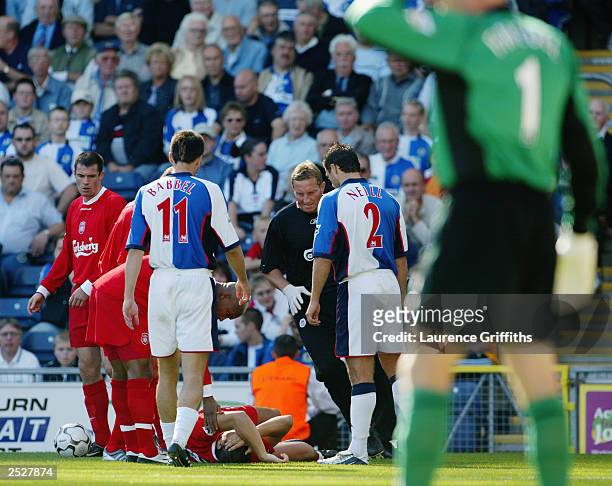 Milan Baros of Liverpool lies on the floor with a broken leg during the FA Barclaycard Premiership match between Blackburn Rovers and Liverpool on...