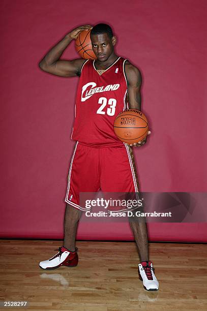 LeBron James of the Cleveland Cavaliers poses for a picture during the 2003 NBA Rookie shoot on September 10, 2003 in New York, New York. NOTE TO...