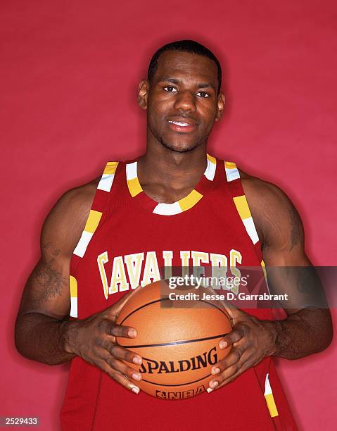 LeBron James of the Cleveland Cavaliers poses for a portrait during the 2003 NBA Rookie Shoot on September 10, 2003 in New York City, New York. NOTE...