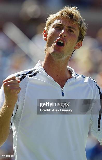 Juan Carlos Ferrero of Spain celebrates his win over Andre Agassi during the US Open men's singles semi-finals at the USTA National Tennis Center in...