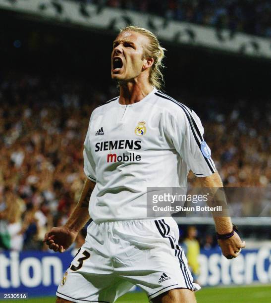 David Beckham of Real Madrid celebrates Real Madrid's opening goal during the UEFA Champions League Group F match between Real Madrid and Olympic...