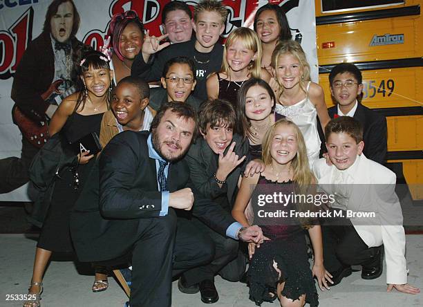 Jack Black and fellow cast members attend the premiere of the movie "School of Rock" at the Cinerama Dome September 24, 2003 in Hollywood, California.