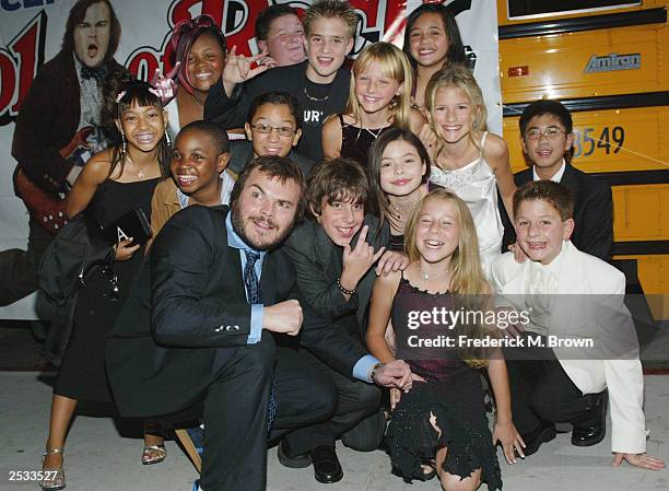 Jack Black and fellow cast members attend the premiere of the movie "School of Rock" at the Cinerama Dome September 24, 2003 in Hollywood, California.