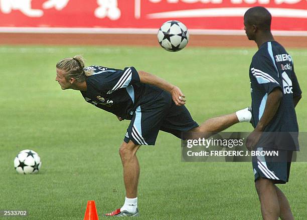 Real Madrid's new signing England international David Beckham practices ball control during a training session, 01 August 2003 in Beijing's Workers...