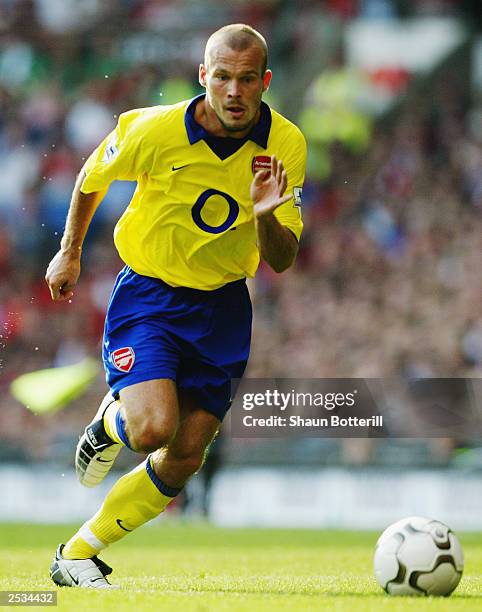 Freddie Ljungberg of Arsenal makes a break forward during the FA Barclaycard Premiership match between Manchester United and Arsenal held on...