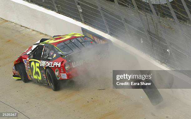 Joe Nemechek driving the UAW Chevrolet hits the wall during the MBNA America 400 on September 21, 2003 at the Dover International Speedway in Dover,...