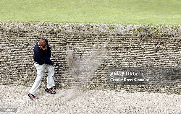 Actor Samuel L. Jackson plays from a bunker on the par four seventh hole during the second round of the Dunhill Links Championship on the Old Course...