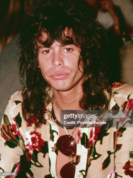 Candid headshot portrait of American singer Steven Tyler of Aerosmith at a luncheon for the film Sgt. Pepper's Lonely Hearts Club Band, England, 1978.