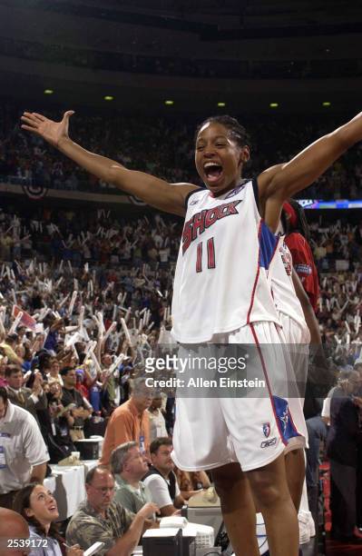 Kedra Holland-Corn of the Detroit Shock celebrates after game three of the 2003 WNBA Finals against the Los Angeles Sparks at the Palace of Auburn...
