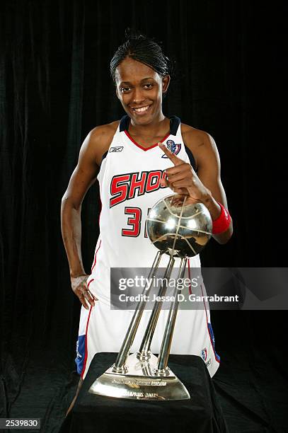 Swin Cash of the Detroit Shock celebrates with the 2003 WNBA Championship trophy after the Shock defeated the Los Angeles Sparks in Game three of the...